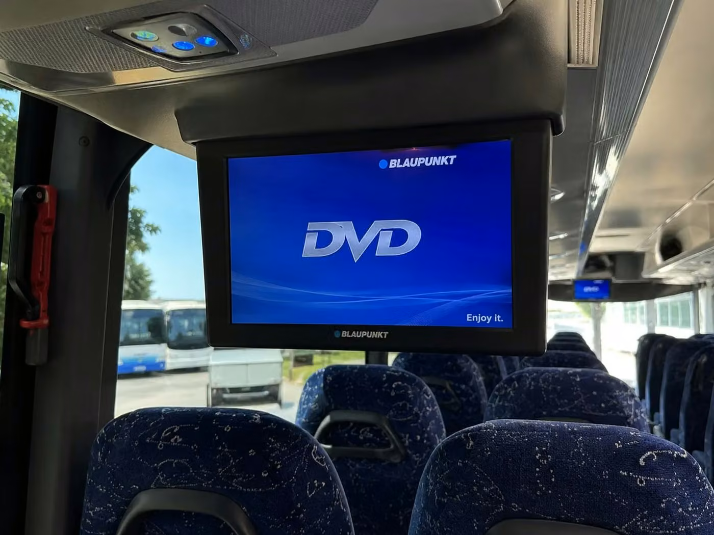brighton 56 passenger charter bus tvs