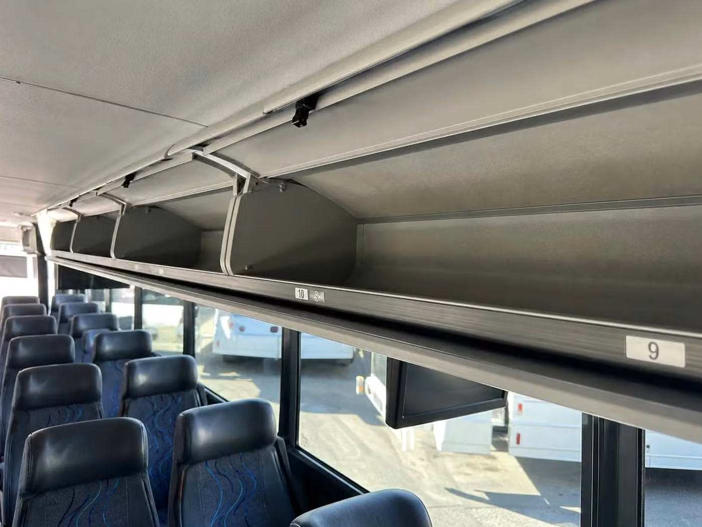 brighton charter bus overhead storage